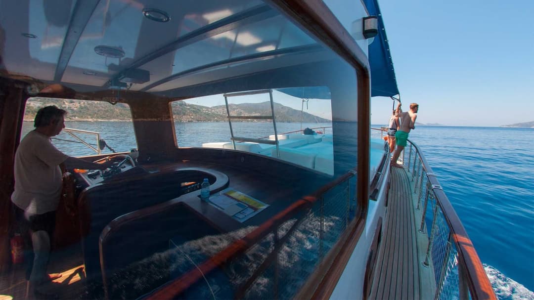 Kalkan's Turquoise Waters: 12-Person Luxury 13m Boat for Full-Day Rentals, Sunset Tours, Kalkan Bays Tours, Onboard Proposals, Birthdays & Bachelor Parties